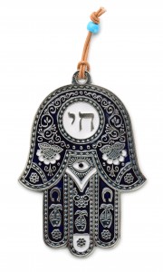 Hamsa hand amulet isolated on white